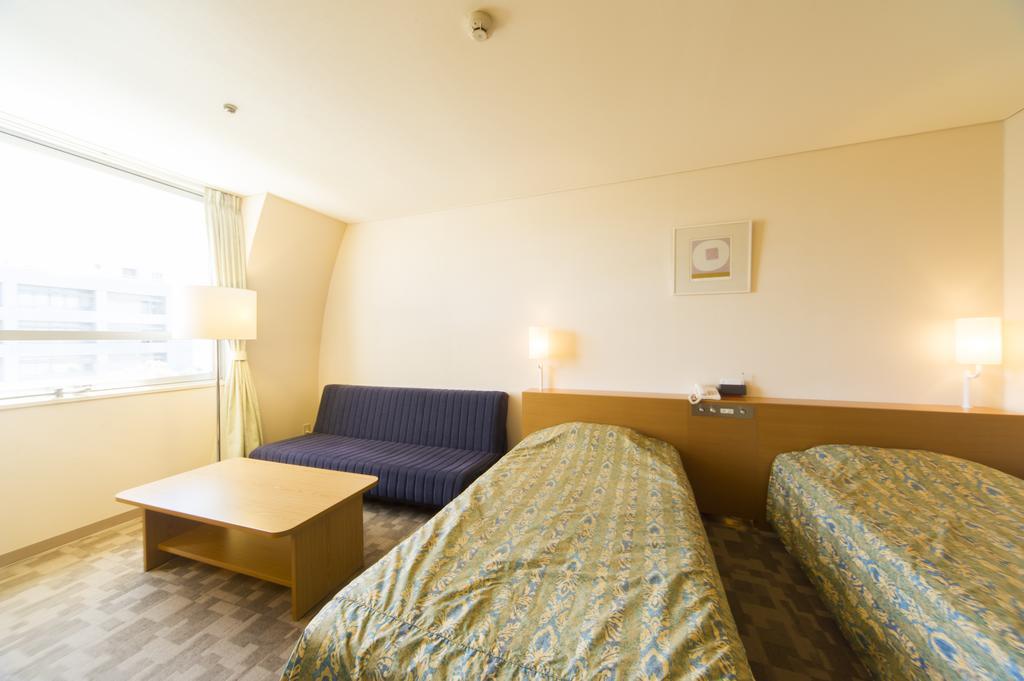 Hotel Hiroshima Sunplaza Habitación foto