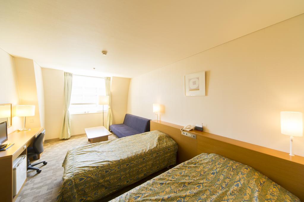 Hotel Hiroshima Sunplaza Habitación foto